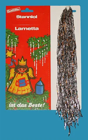lametta: thin wire or foil made of brass, gold or silver; now especially thin strips of metallic foil used...