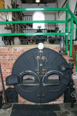 lancashire boiler: a steam boiler with two flues that contain the furnaces and extend through the boiler from one end...