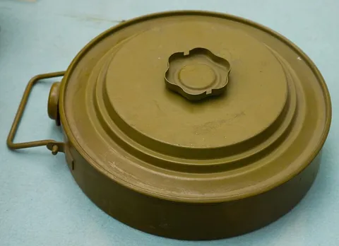 land mine: a mine that is placed on land and designed to explode when stepped upon or touched