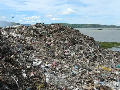 landfill: to dispose of (garbage) by burying it at a landfill site