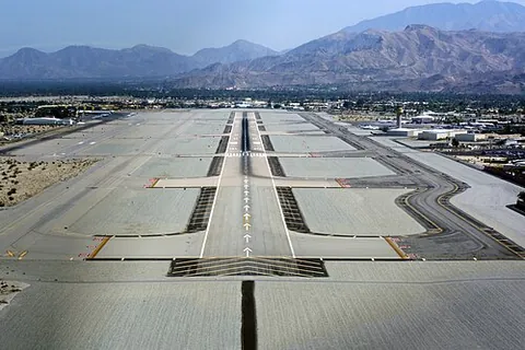 landing strip: a runway for aircraft, especially one which is auxiliary or temporary