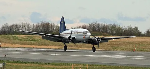 landing: an arrival at a surface, as of an airplane or any descending object