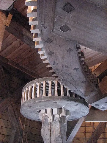 lantern wheel: a pinion with cylindrical staves, instead of teeth, inserted at their ends in two parallel disks or...