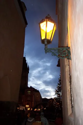 lantern: a case of translucent or transparent material made to protect a flame, or light, used to illuminate...