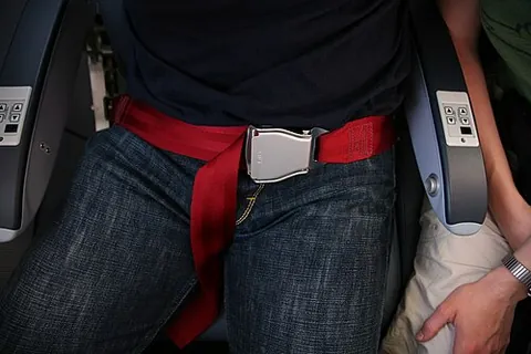 lap belt: a seat belt that passes over the hips and does not itself provide restraint to the upper body...