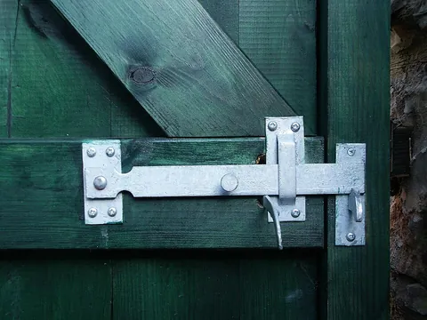 latch: to close or lock as if with a latch