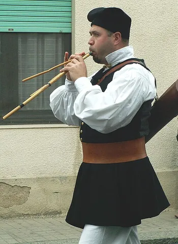 launeddas: a traditional Sardinian polyphonic woodwind instrument made of three pipes, each of which has an...