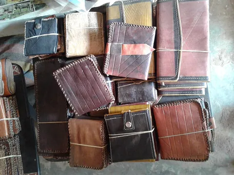 leather: a tough material produced from the skin of animals, by tanning or similar process, used e.g. for...