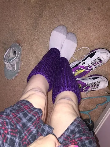 leg warmer: a type of garment similar to a footless sock, which usually extends from below the knee to above...