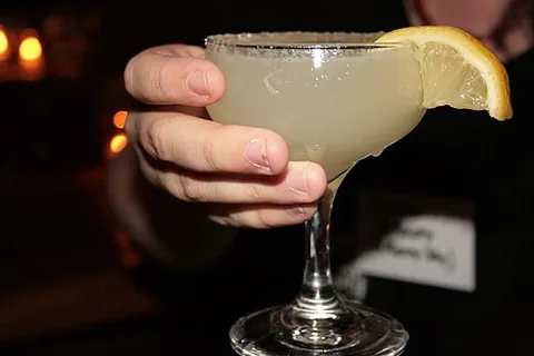 lemon drop martini: a cocktail typically made with vodka, lemon juice, and syrup, usually served in a martini glass...