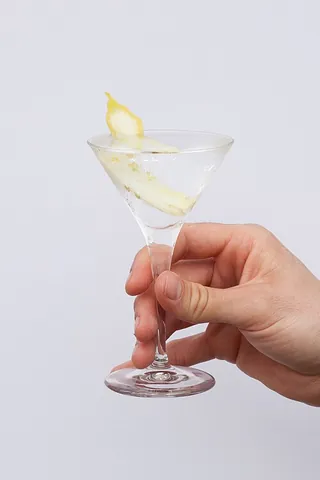 lemon martini: a martini with a lemon slice or lemon zest