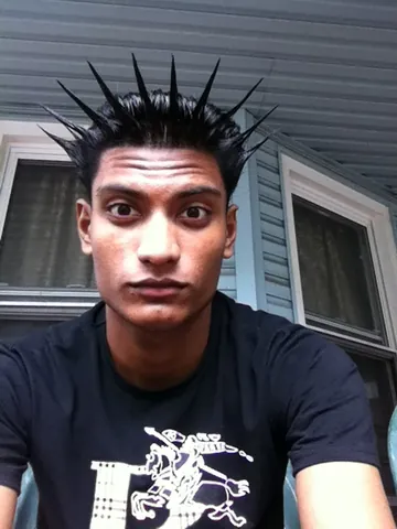liberty spike: a stiff spike formed of many strands of hair (while still attached to the head)