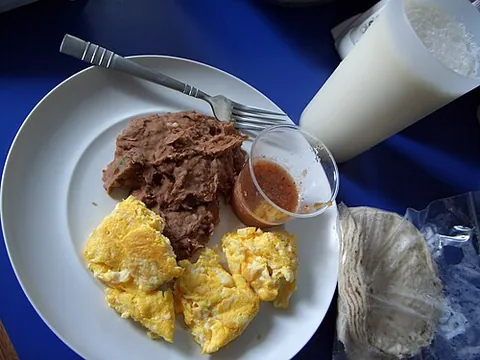 licuado: a Latin American handmade blended beverage similar to a smoothie, made with milk, fruit, and...