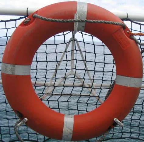 life belt: a buoyant ring carried on board ships that can be thrown to someone in the water in an emergency to...