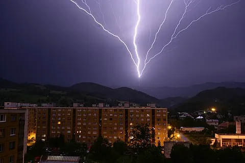lightning: a flash of light produced by short-duration, high-voltage discharge of electricity within a cloud,...