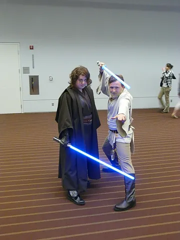 lightsaber: a sword having a blade made of a powerful beam of light or energy