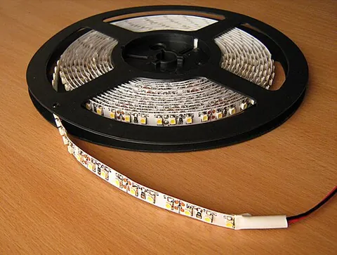 lightstrip: a strip of small light bulbs, LEDs, or other light-emitting devices