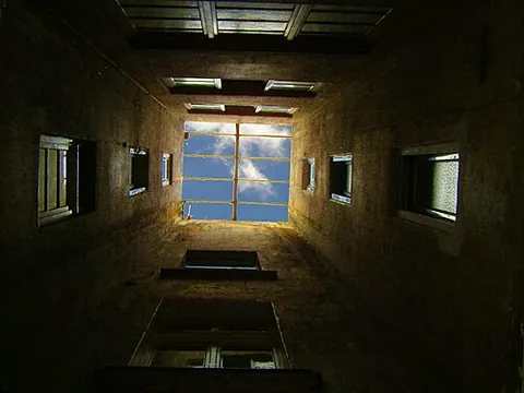 lightwell: an open shaft that transmits light from above into a staircase or an inner room