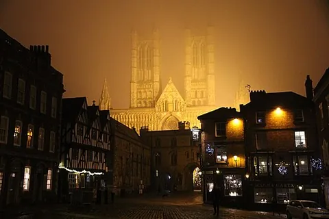 lincoln: a city and local government district in Lincolnshire, England (OS grid ref SK9771)