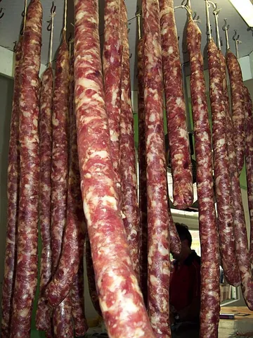 linguica: a Portuguese garlic and paprika seasoned smoke cured pork sausage