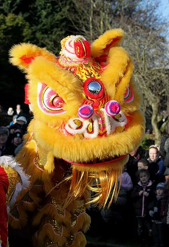 lion dance: a traditional Chinese dance where performers mimic a lion's movements in a lion costume