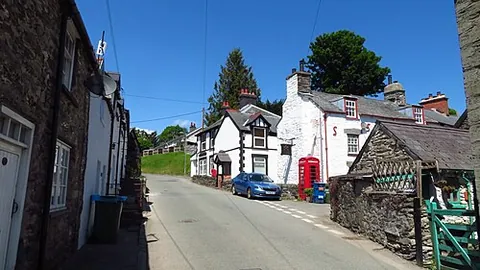 llandderfel: a village and large community in Gwynedd, Wales, historically in Merionethshire (OS grid ref SH9837)