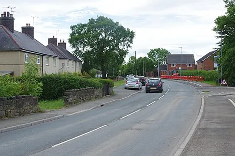 llay: a village and community in Wrexham borough, Wales (OS grid ref SJ3355)