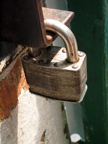 lock: something used for fastening, which can only be opened with a key or combination