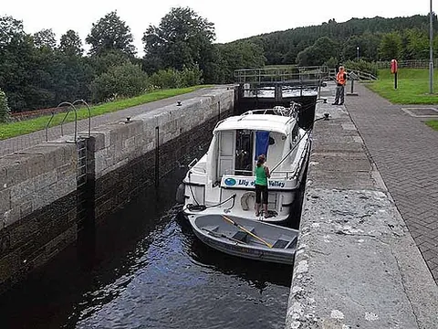 locktender: a tender of a lock on a waterway (e.g., canal or river)