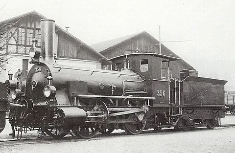 locomotive: the power unit of a train that pulls the coaches or wagons