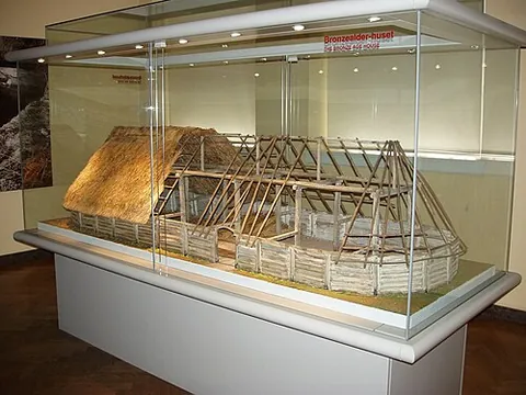 longhouse: a long communal housing of the Iroquois and some other American Indians, the Malaysians, the...