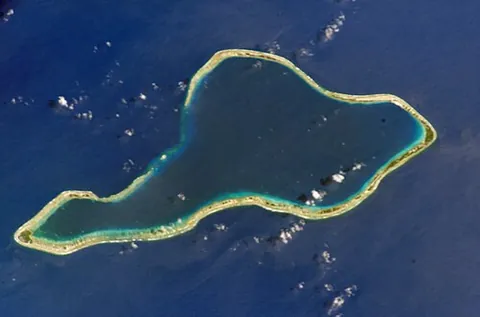 low island: an island of coral origin