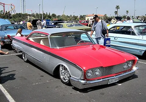 lowrider: a vehicle, usually a passenger car, with its suspension system modified so that it rides as low to...