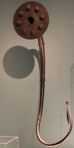 lur: a long natural blowing horn without finger holes, played by embouchure
