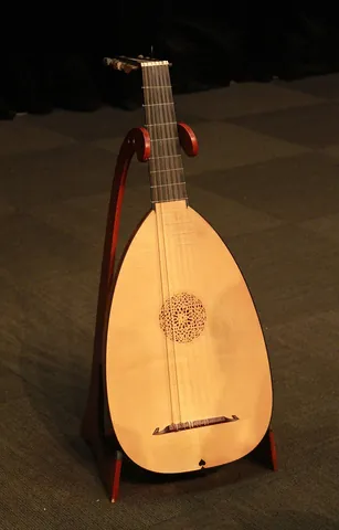 lute: a fretted stringed instrument, similar to the guitar, having a bowl-shaped body or soundbox; any of...