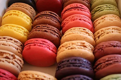 macaron: any of various confections made with almond and egg white, traditionally made in France