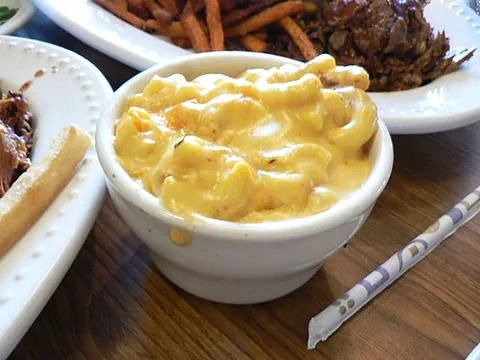 macaroni cheese: a savory dish made from cooked macaroni and cheese sauce