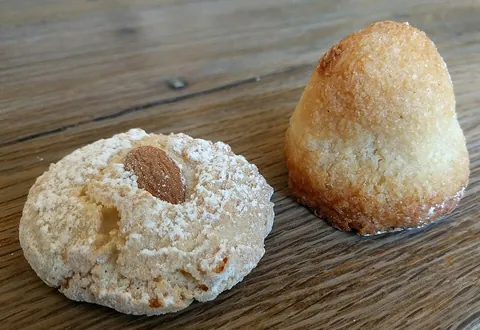 macaroon: a soft biscuit or cookie prepared with almond or coconut dough