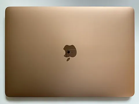macbook: a MacBook-brand notebook computer, manufactured by Apple Computer