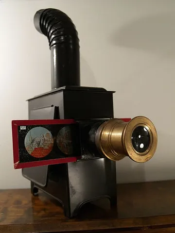 magic lantern: an early light projector and precursor to the slide projector that could achieve simple animation...