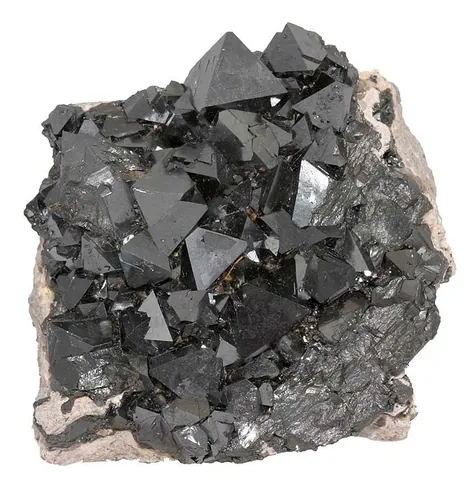 magnetite: a magnetic mineral, with the chemical formula Fe²⁺Fe3+2O₄, one of the primary ores of iron