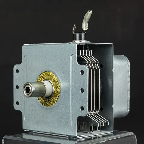 magnetron: a device in which electrons are made to resonate in a specially shaped chamber and thus produce...