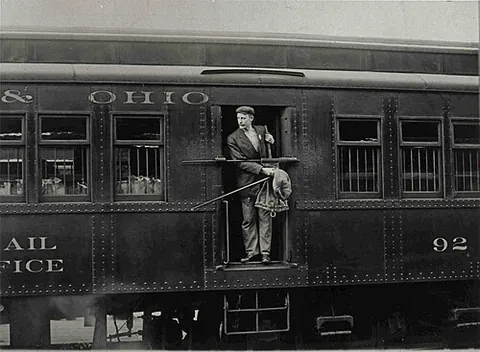 mail car: a railroad car in which mail is carried and sorted