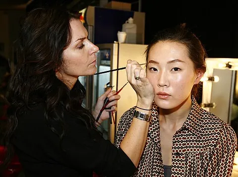 make-up artist: a person who applies makeup and prosthetics for theatrical, television, film, fashion, magazines...