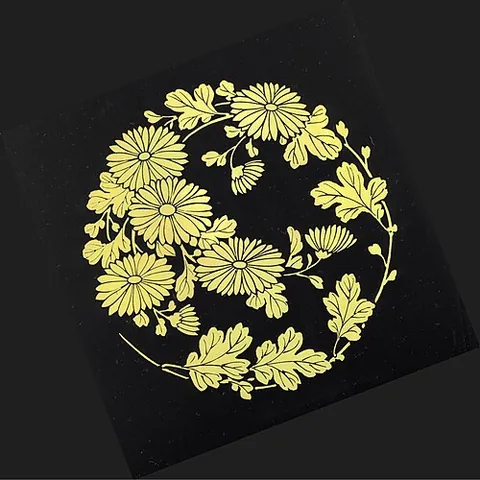 maki-e: a style of Japanese lacquerware made with gold or silver sprinkled on wet lacquer