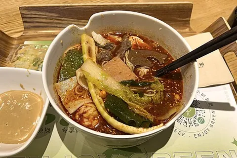 malatang: a hot, spicy soup of meat and vegetables, commonly eaten as a street food in China