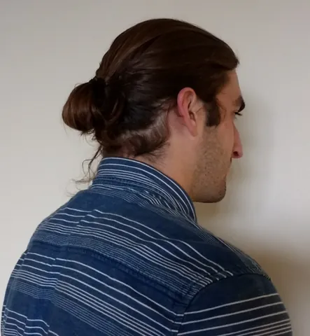 man-bun: the bun hairstyle when worn by a man or boy