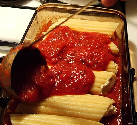 manicotti: wide tubes of pasta filled with a savoury stuffing and baked in the oven