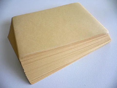 manila paper: a stiff paper with a yellowish-brown finish made from hemp obtained from the abaca plant