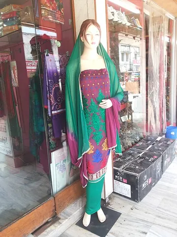 mannequin: a dummy, or life-size model of the human body, used for martial arts training or the fitting or...